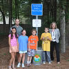 Oyster recycling bin for Sullivan’s Island Elementary School with participating students and Principal Ms. Susan King